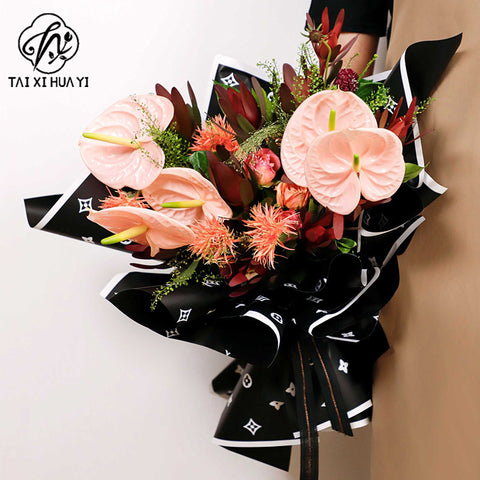 Manufacturer wholesale fashion simple flower wrapping paper light luxury creative four-leaf clover high-end flower shop floral material package flower paper