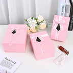 Customized Portable Pink Square Paper Gift Box with UV Coating Bow Mug Set Pen Wine Lid