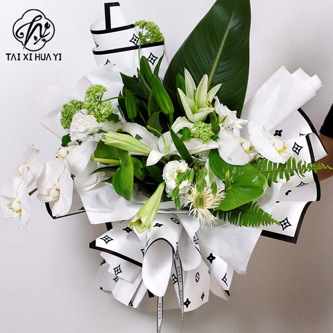 Manufacturer wholesale fashion simple flower wrapping paper light luxury creative four-leaf clover high-end flower shop floral material package flower paper