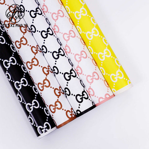Manufacturer wholesale fashion simple flower wrapping paper light luxury creative four-leaf clover high-end flower shop floral material package flower paper
