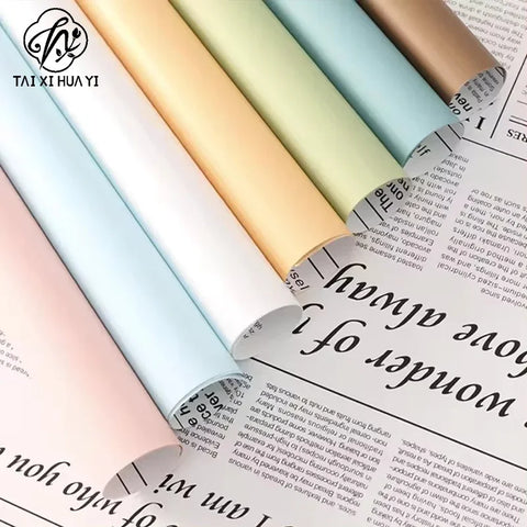 Snow White Flower Packaging Paper Single-Sided Coated OPP Waterproof Plastic with English Newspaper Design