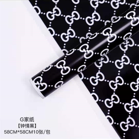 Manufacturer wholesale fashion simple flower wrapping paper light luxury creative four-leaf clover high-end flower shop floral material package flower paper