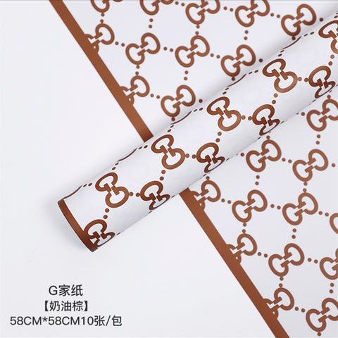Manufacturer wholesale fashion simple flower wrapping paper light luxury creative four-leaf clover high-end flower shop floral material package flower paper