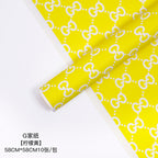 Manufacturer wholesale fashion simple flower wrapping paper light luxury creative four-leaf clover high-end flower shop floral material package flower paper