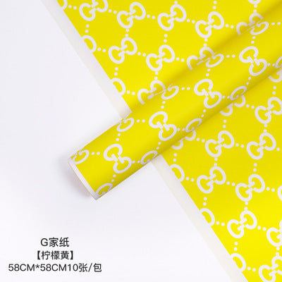 Manufacturer wholesale fashion simple flower wrapping paper light luxury creative four-leaf clover high-end flower shop floral material package flower paper