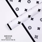 Manufacturer wholesale fashion simple flower wrapping paper light luxury creative four-leaf clover high-end flower shop floral material package flower paper