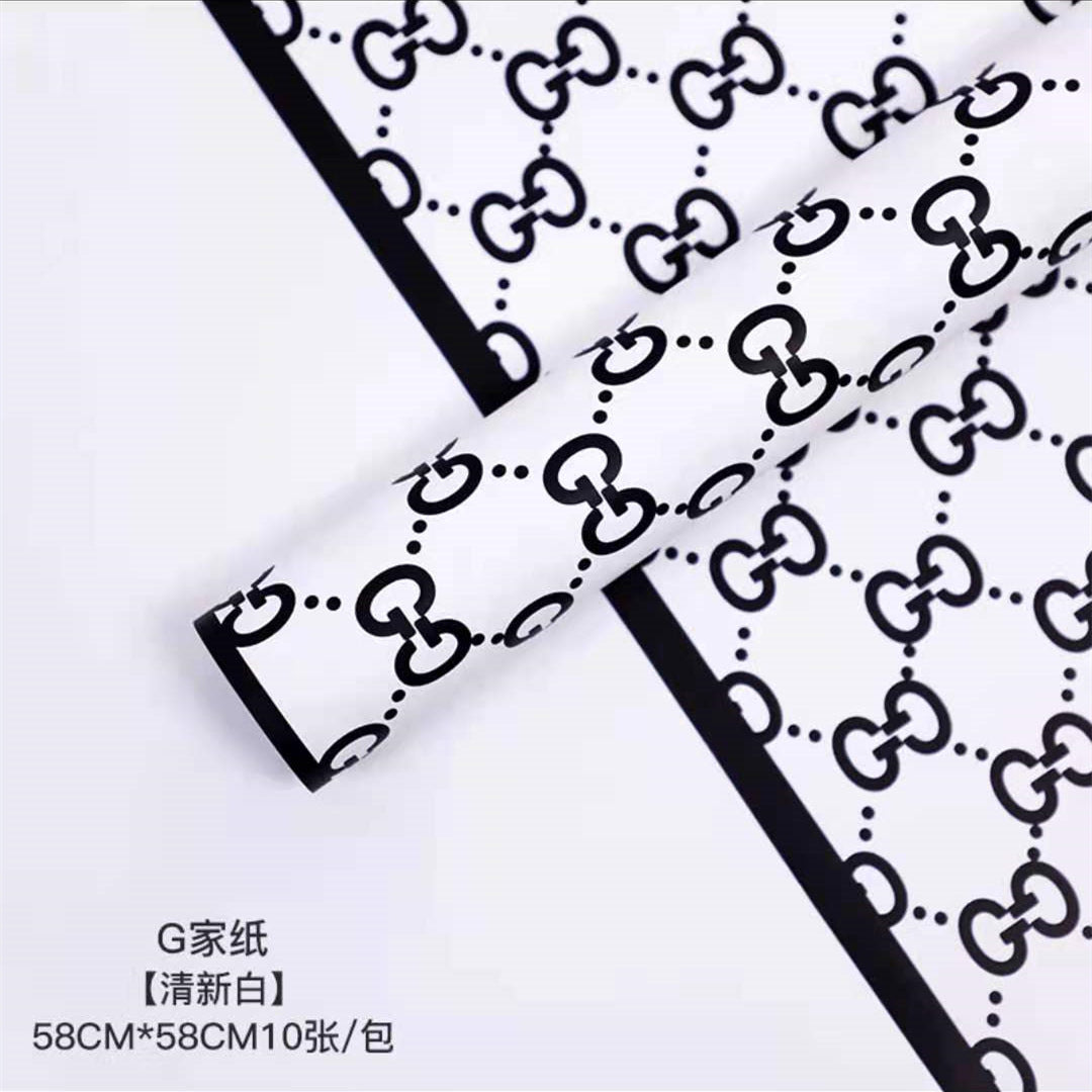 Manufacturer wholesale fashion simple flower wrapping paper light luxury creative four-leaf clover high-end flower shop floral material package flower paper