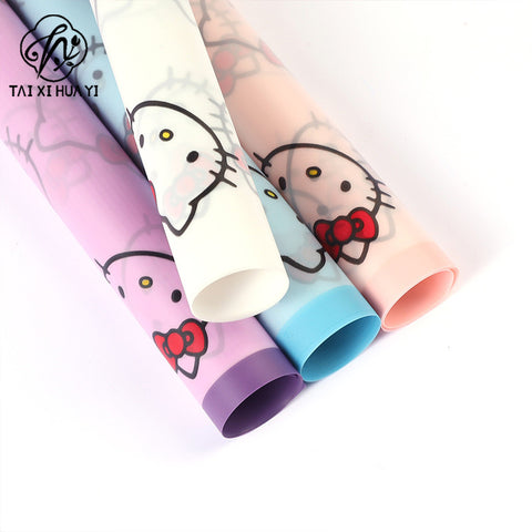 Cartoon magic edge bow cat cat head cat kt matte translucent paper bouquet wrapping paper waterproof floral packaging